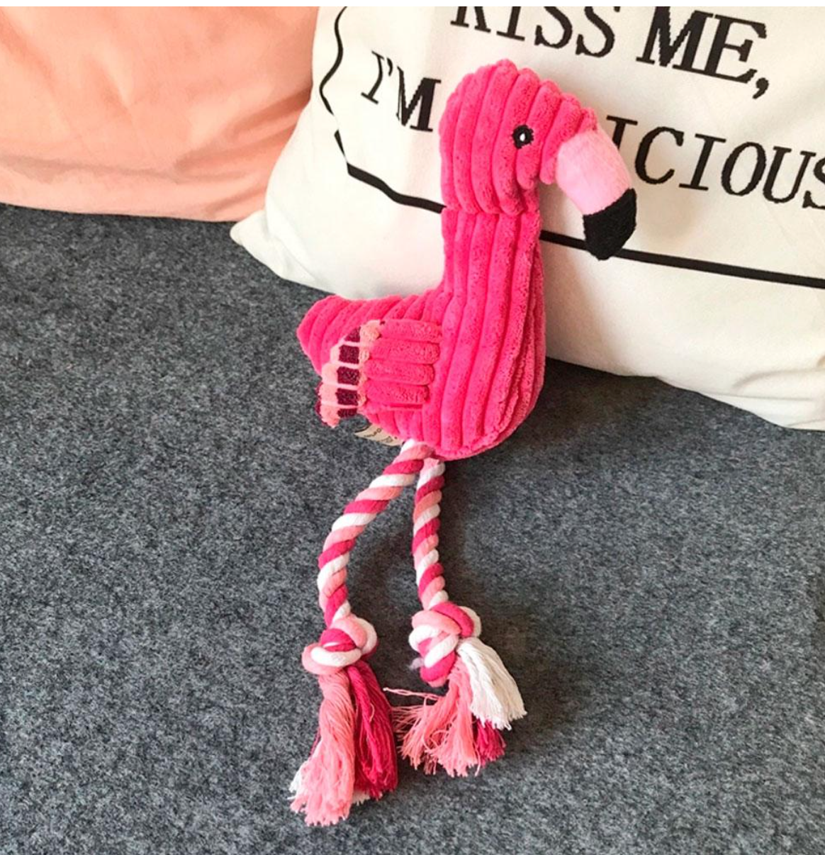 The Flamingo Squeaky Plush Toy: Keep your pet entertained and engaged with this adorable toy.