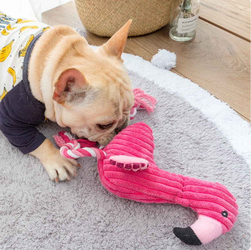 The Flamingo Squeaky Plush by HappinessPaws™: Made from safe materials for your pet's enjoyment and safety.