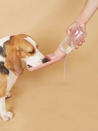 HappinessPaws™ Foldable Water Bottle: Hydrate your pet efficiently during walks, hikes, and trips.