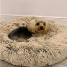 An M-sized Taupe Absolut Soothing Bed by HappinessPaws™, offering a 70 by 70 centimeter cozy space for pets to relax.