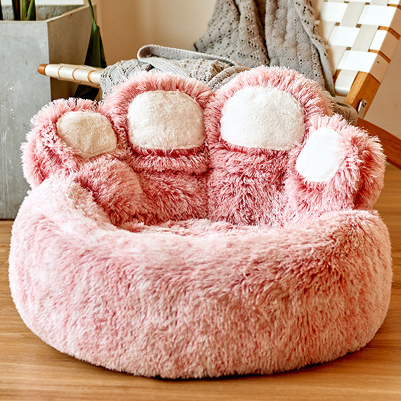 A Blush-colored haven: the Soothing HappinessPaws Bed™, providing a plush and comforting spot for your furry friend