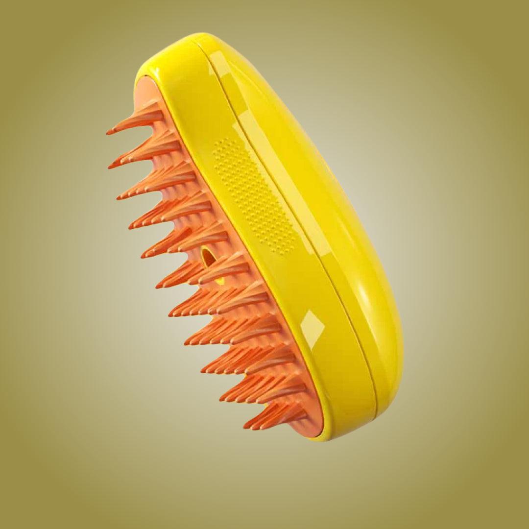 Side view of the yellow HappinessPaws dog grooming brush with orange bristles, designed for gentle grooming.