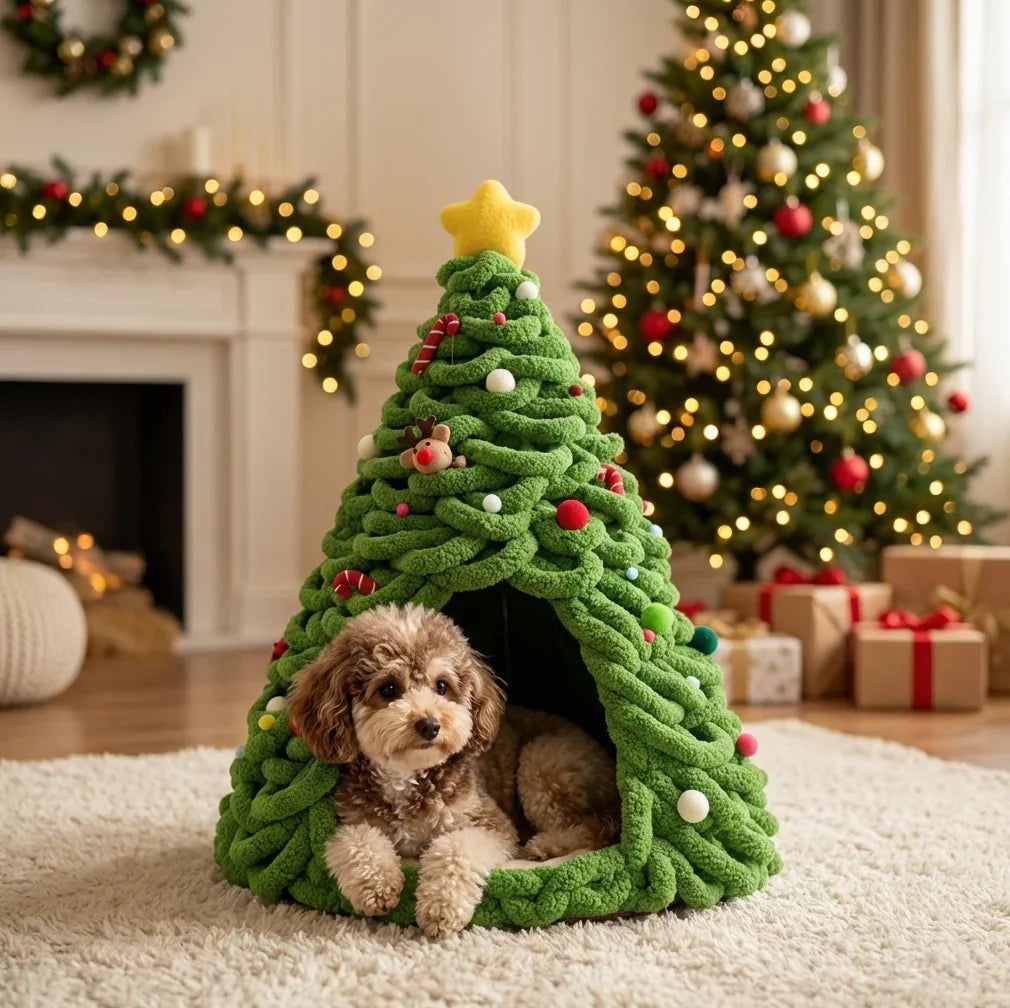 Cream-colored poodle inside the Christmas Dog Bed in front of a decorated fireplace and glowing Christmas tree.