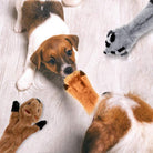 Playful puppy interacting with three plush squeaky toys resembling small animals, providing an engaging and chewable playtime experience.